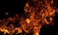 Fire flame textured background. Burning fire. Fire flames on black background. Blaze fire flame background. Royalty Free Stock Photo