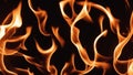 fire flames background A fiery background with a black and orange color scheme and a realistic effect_ fire, background, Royalty Free Stock Photo