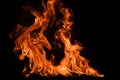 Fire flames on black background. Fire burn flame isolated, abstract texture. Flaming effect with burning fire. Royalty Free Stock Photo