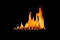 Fire flames. isolated Black background. Royalty Free Stock Photo