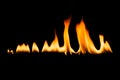 Fire flames. isolated Black background. Royalty Free Stock Photo