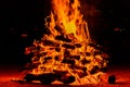 Fire flames with reflection on black background. Royalty Free Stock Photo