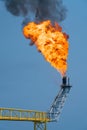 Fire on flare stack at offshore oil and gas central processing platform while burning toxic and release over pressure.