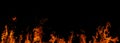 fire frame with large central copy space.Burning Flames on Black Background. fiery flames of a dark background. Royalty Free Stock Photo
