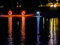 Fire games at night at the beach of the riverside of the river Rhein in Cologne at night