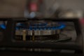 Fire on the gas stove burner. Burner gas stove, concept of energy. Closeup, selective focus Royalty Free Stock Photo