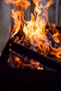 Fire in the grill, bonfire, flame. Burning firewood close up. Charcoal Royalty Free Stock Photo