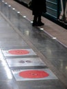 Fire hatches at the Moscow metro station. Red covers on the floor of the platform at the wells with fire hydrants in the subway