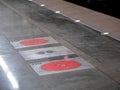 Fire hatches at the Moscow metro station. Red covers on the floor of the platform at the wells with fire hydrants in the subway