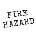 FIRE HAZARD stamp on white Royalty Free Stock Photo