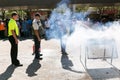 Fire hazard training with a powder-based extinguisher