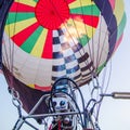 Fire heats the air inside a hot ai r balloon at balloon festival Royalty Free Stock Photo