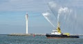 Fire hose boat `The Zeehond` spraying water in Oostende