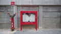 Fire Hose cabinet in red color.It is emergency equipment. it use when on fire Royalty Free Stock Photo