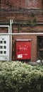 Fire hose reel on the wall in Hongkou District