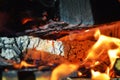 Fire, hot flames and wooden oven. Wood dark hard logs burning, orange flames and hot temperature Royalty Free Stock Photo