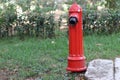 Fire hydrant, fireplug, or firecock on a street side. It is a connection point by which firefighters can tap into a water supply Royalty Free Stock Photo