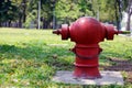 Fire Hydrant Red color of thai on Garden, sidewalk Royalty Free Stock Photo