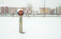 Old fire hydrant for firefighters on the street in the city with snow in the winter season Royalty Free Stock Photo