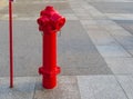 A Fire Hydrant, Waterplug, or Firecock on City Street, Red Steel Pipe, Urban Fire-Fighting Equipment Royalty Free Stock Photo