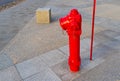 A Fire Hydrant, Waterplug, or Firecock on City Street, Red Steel Pipe, Urban Fire-Fighting Equipment Royalty Free Stock Photo