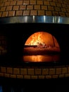 Fire inside stone oven for cooking pizza