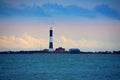 Fire Island Lighthouse with beaming light on Long Island Sound, New York