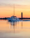 Fire Island, New York - December 11, 2019 : Captree Princess fishing boat sailing through the Great South Bay at sunset Royalty Free Stock Photo