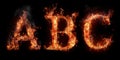 Fire letters ABC font alphabet made of burning letters on black background