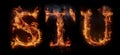 Fire letters STU font alphabet made of burning letters on black background