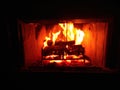 Fire logs Burning In A Fireplace Royalty Free Stock Photo