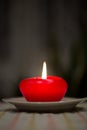 The fire of a lonely candle Royalty Free Stock Photo