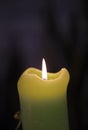 The fire of a lonely candle Royalty Free Stock Photo
