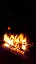 Fire from the fire in nature. sparks from fire. Black background Royalty Free Stock Photo
