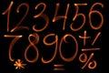 The fire numbers set collection alphabet on black background Royalty Free Stock Photo