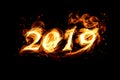Fire numbers 2019 of smoke on a black background with sparks Royalty Free Stock Photo