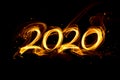 Fire numbers 2020 with sparks on a black background Royalty Free Stock Photo