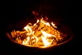 Fire Pit at night showing glowing embers Royalty Free Stock Photo