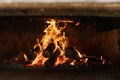 Fire place outdoor. Firewood. Yeallow fire and red hot coals