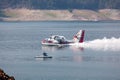 Fire Plane Scooping Water from a Lake
