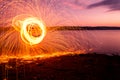 Fire Poi at sunset on the lake