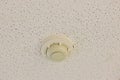 Fire protection. Smoke detector in the room on white ceiling in the building, sensor action when the smoke detected. smoke Royalty Free Stock Photo