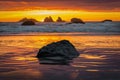 Fire red sunset over sea stacks at Oregon Coast. Royalty Free Stock Photo