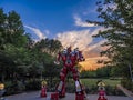 A Fire Robot standing with colorful sky.