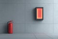 Fire safety equipment displayed in modern interior setting with illuminated guide and fire extinguisher Royalty Free Stock Photo