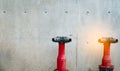 Fire safety pump on cement floor of concrete building. Deluge system of firefighting system. Plumbing fire protection. Red fire Royalty Free Stock Photo