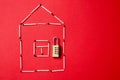 Fire safety, or security and protection concept. A fire extinguisher, the figure of the house and lock Royalty Free Stock Photo