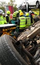 Fire service and ambulance crews at a car crash Royalty Free Stock Photo