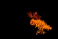 Fire in the shape of an alien UFO with wings. The flame on the black background is isolated Royalty Free Stock Photo
