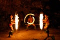 Fire show in famous Hina cave, blurred motion, Oholei beach, Ton